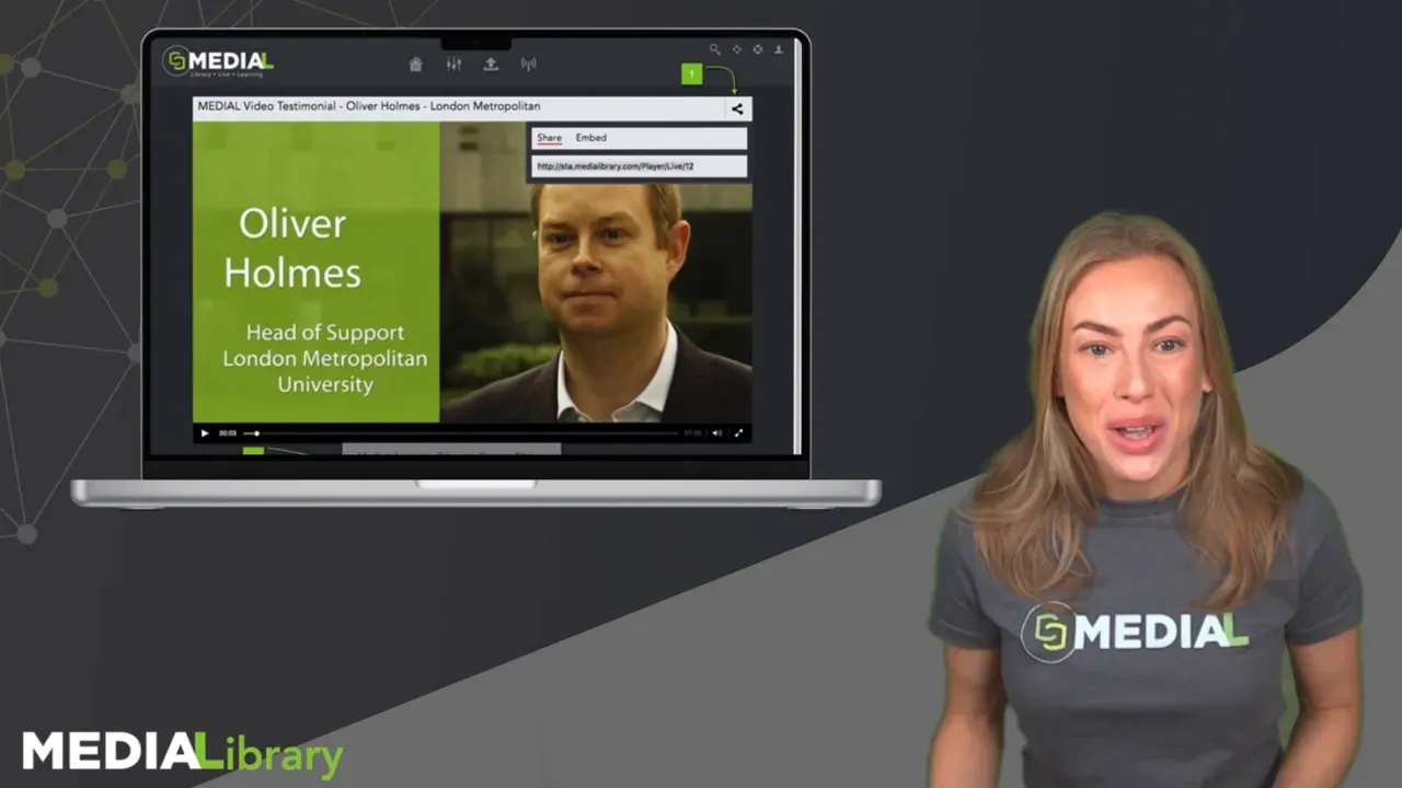 MEDIALibrary playback interface shown on a laptop with a testimonial video and the presenter standing to the right.
