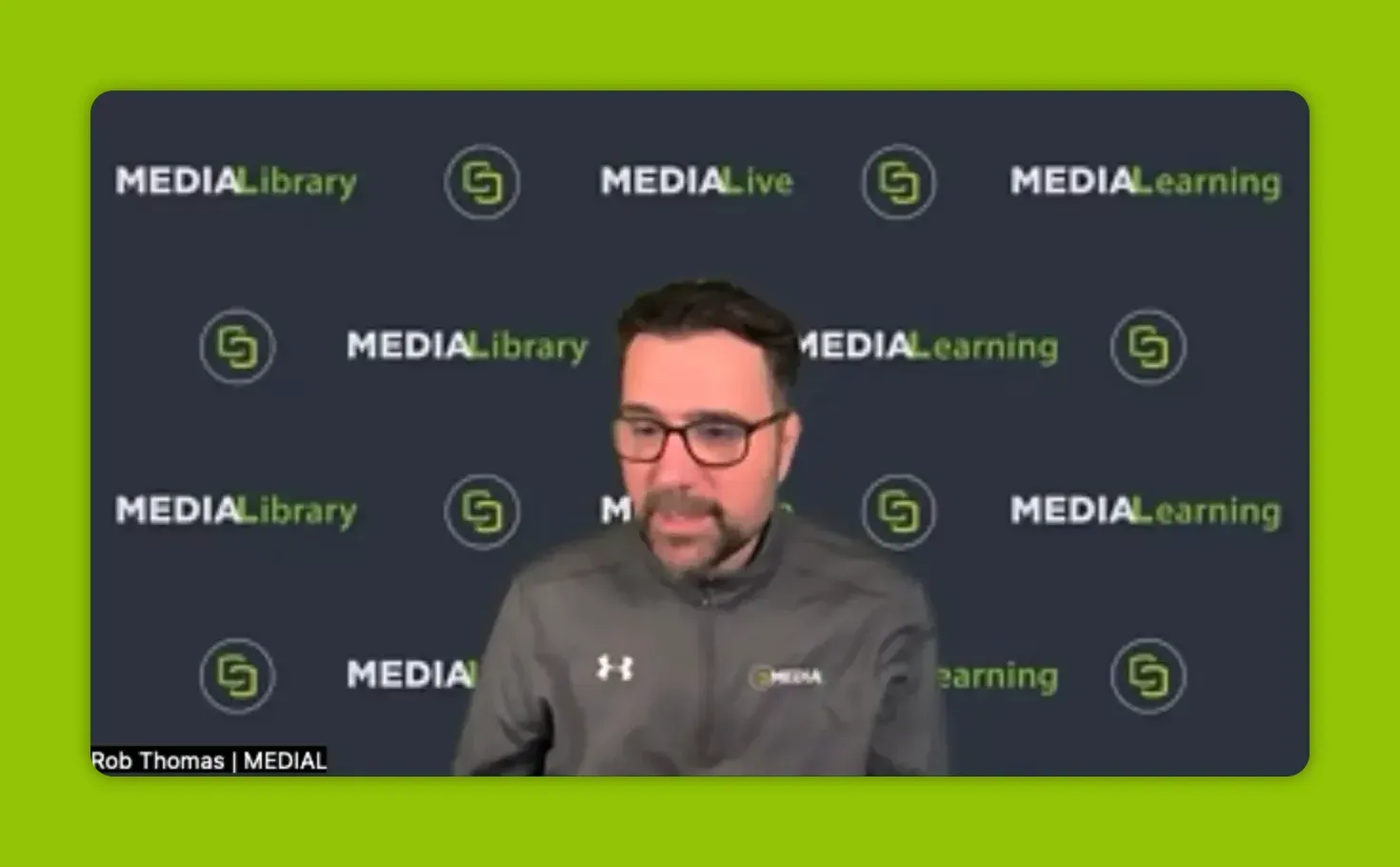 Speaker on MEDIAL webinar background with MEDIALLibrary and MEDIALlearning logos